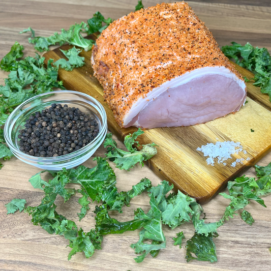 Pepper crusted pork roasting joint